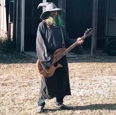 Kendelf the green of Medieval/Fantasy Folk/Rock band Elflore during music video shoot.