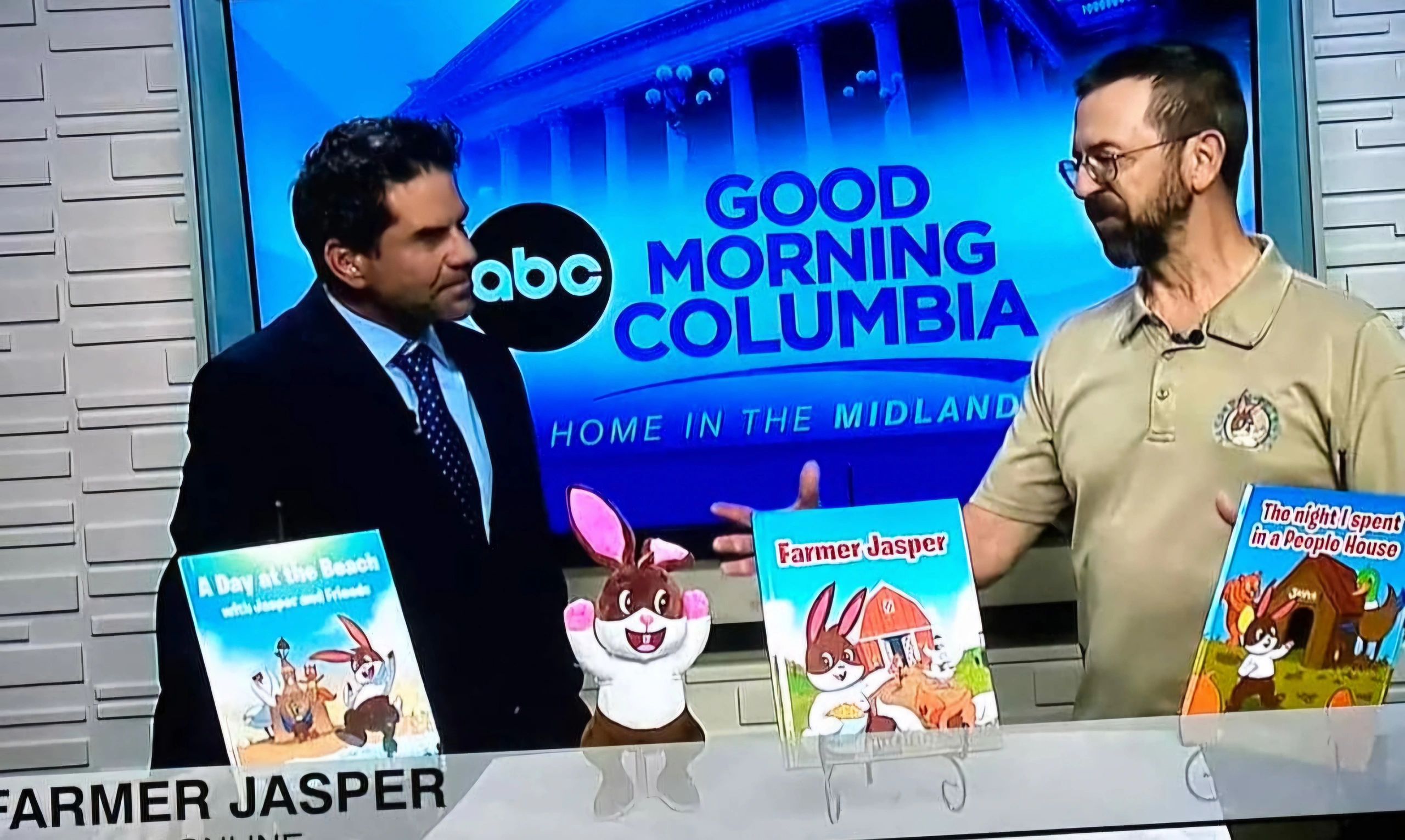Two men discuss children's books on Good Morning Columbia TV show.