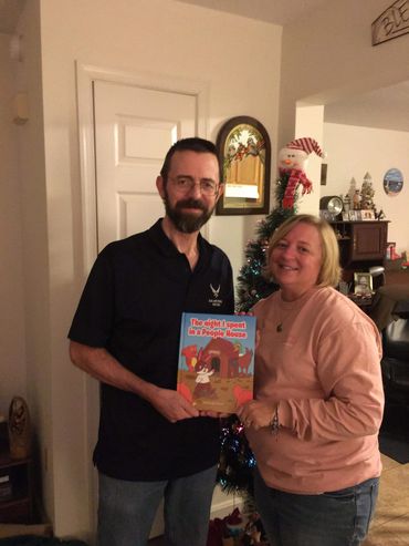 My sister admiring my first childrens picture book!