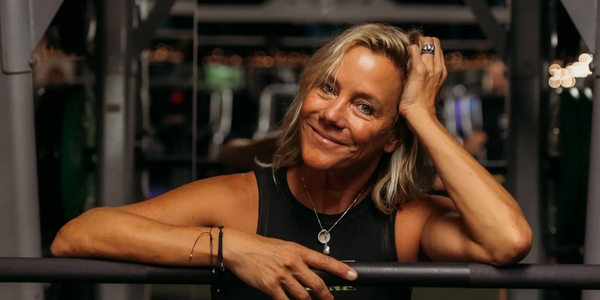Gym owner, personal trainer, happy, energetic female fitness enthusiast.