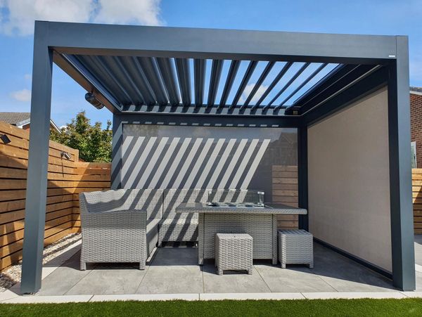 Motorised louvered roof fully retractable with motorised side screens privacy and weather protection