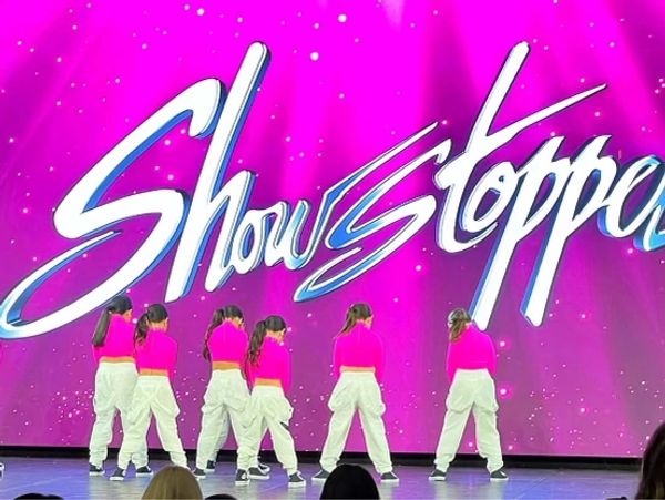 show stopper performance of a team dancing to hip hop music