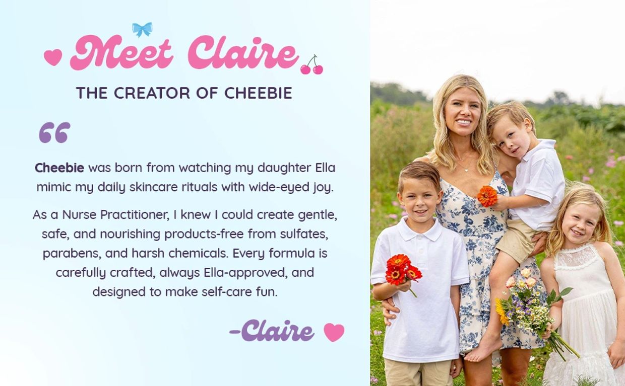 Claire with her three children in a field holding flowers.