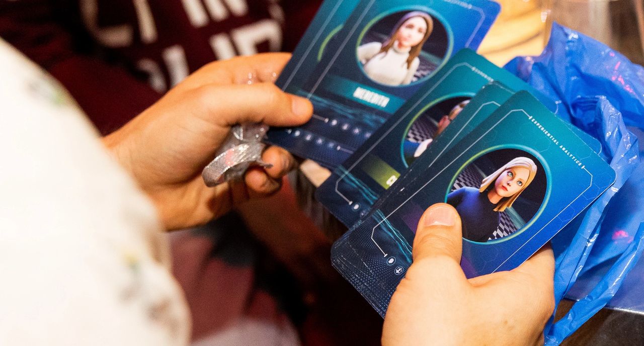 Team members represented as avatars in a "take-home" deck of cards 