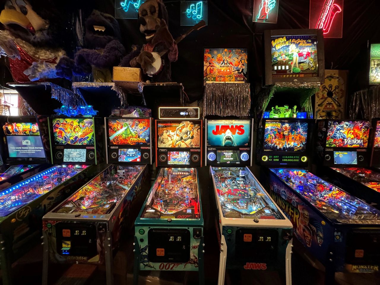 Current pinball machines mixed with vintage gaming artifacts at Marvin's Marvelous Mechanical Museum