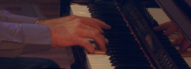 Greg's Hands on the Piano.png