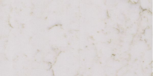 White marble surface with subtle gray and greenish veins.