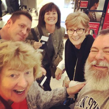 Friends enjoying a beer travel adventure and exploring local brewery culture.