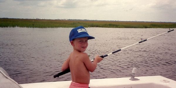 A picture showing that the captain has been fishing since he was a child. 