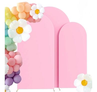 Pink balloon arch with flowers.