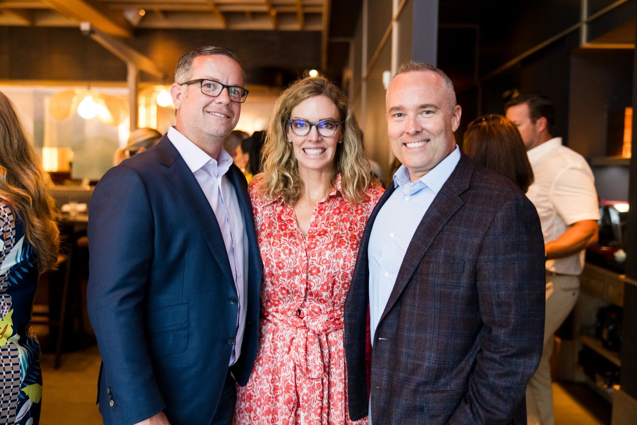 Love You Adam founder Maggie Seeliger with Dr. Craig Bryan, suicide prevention expert and Mark Bordman, COO of Construction Concepts and corporate partner.