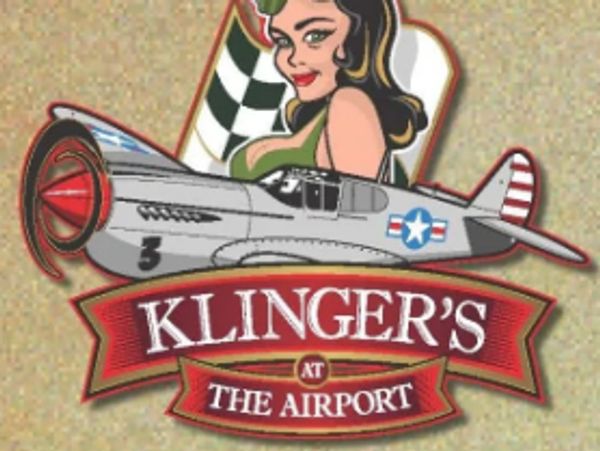 Klinger's logo:colorful  painting of WWII women and plane.