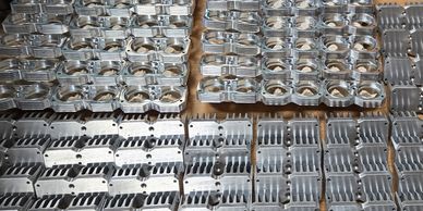 this is a image of CNC parts that are undergoing a quality condole check 
