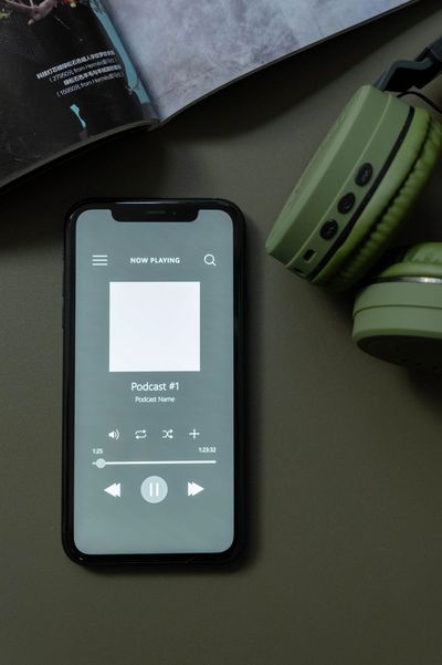 Photo by cottonbro studio: https://www.pexels.com/photo/a-podcast-music-playing-on-a-smartphone-6686