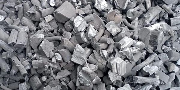 Pile of metallic scraps and fragments in various shapes and sizes.