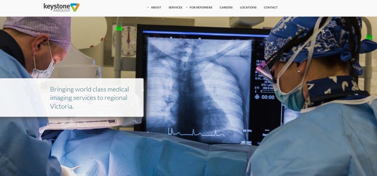 Medical professionals analyzing chest X-ray in a clinical setting.