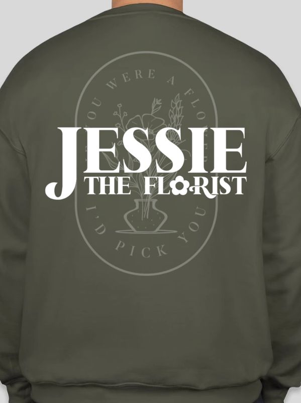 Green sweatshirt with floral logo and text "Jessie The Florist" on back.