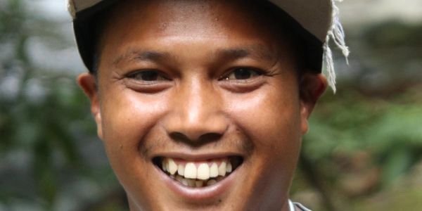 Soleh, the jungle cook preparing meals during overnight treks in Bukit Lawang, Sumatra.