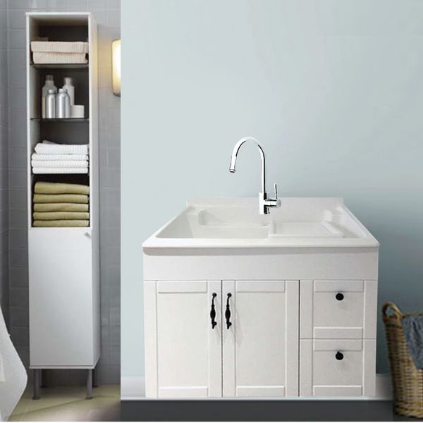 Modern bathroom sink and tall storage cabinet.