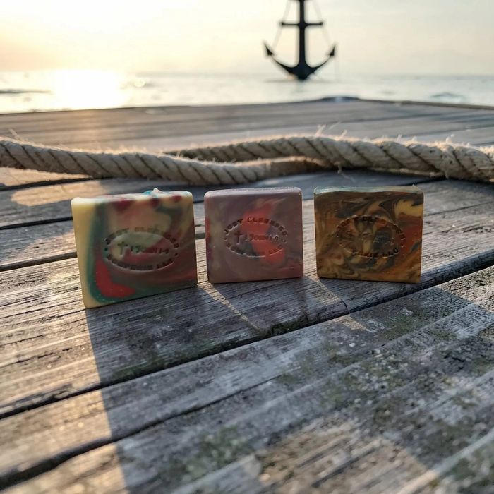 Swirled blue and purple artisan soap bar on a marble surface.
Where Hearts Meet Collection 3/$25