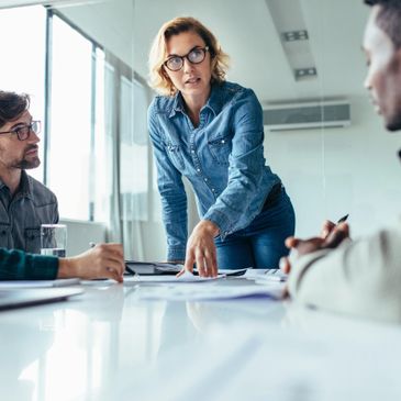 Women leading a Human Resources Team Meeting for a Consulting