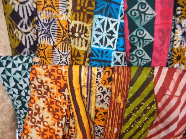 Colorful patterned fabrics with diverse designs.