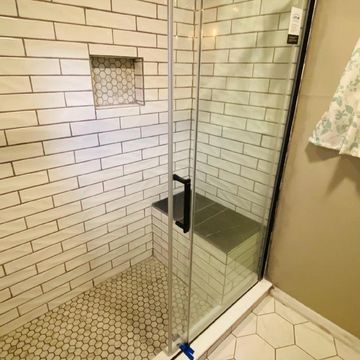 Full Bathroom remodel.
Removed tub, built-in shower shelf, Built-in shower seat & full glass sliding