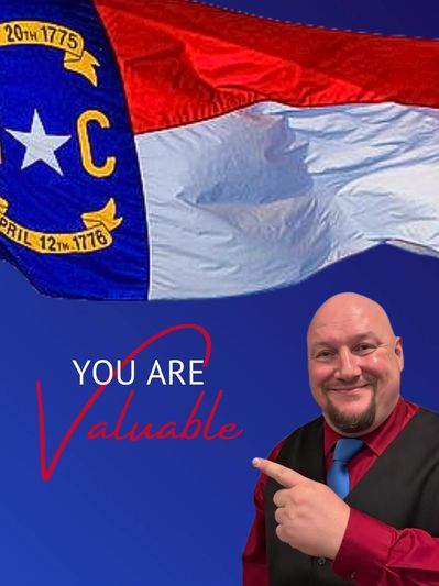 Man pointing with North Carolina flag background and 'You Are Valuable' text.