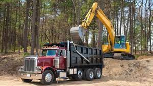 A dump truck and an excavator