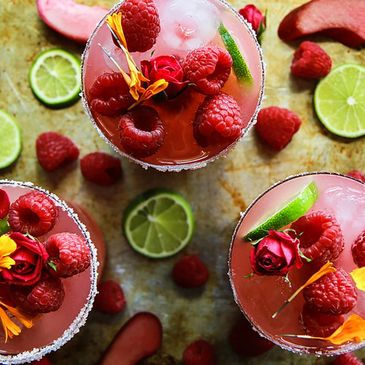 https://img1.wsimg.com/isteam/ip/3a893a80-5dbd-4a7e-a7c2-eacae3dff91d/rhubarb-raspberry-frozen-margarita-1.jpg.webp/:/cr=t:0%25,l:21.88%25,w:56.25%25,h:100%25/rs=w:365,h:365,cg:true