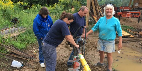 Family built, working on additions to the milling shop