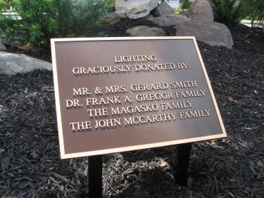 Plaque honoring donors for lighting.
