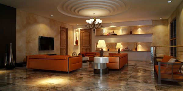Elegant living room with warm lighting and modern orange sofas.