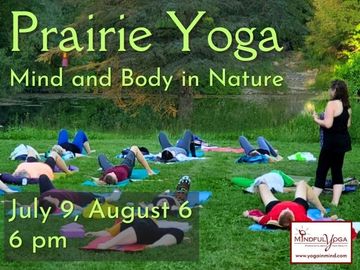 Outdoor yoga session in a grassy prairie led by an instructor at sunset.