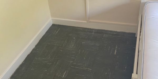Asbestos floor tiles prior to removal