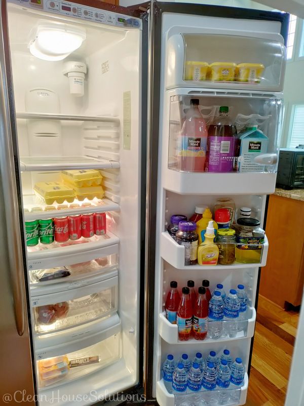 Refrigerator clean out. Organize refrigerator clean refrigerator. Drink filled refrigerator. Fridge