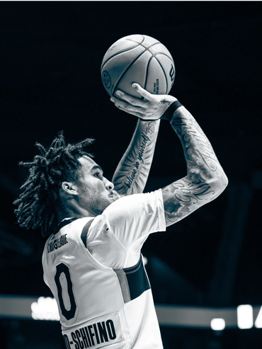 Basketball player preparing to shoot a free throw.