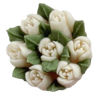 A delicate bouquet of white roses with green leaves.