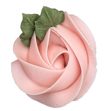 Pink rose-shaped icing with green leaves.