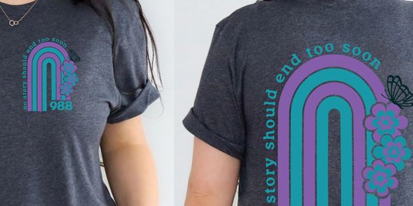 Dark gray T-shirt with teal and purple graphic and text about ending stories too soon.