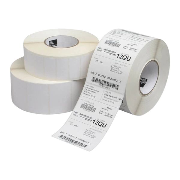 Rolls of white adhesive labels and printed barcode labels.