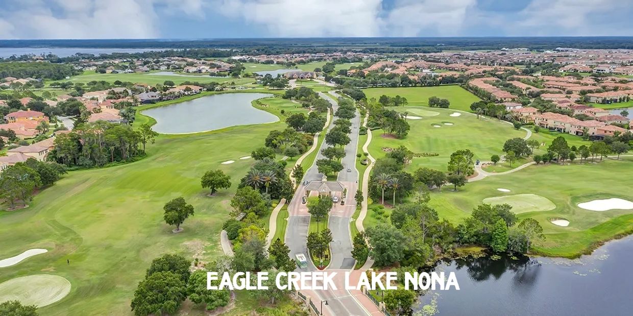 Drone shot of Eagle Creek Lake Nona. Picture of the homes, Golf course, and gate entrance. 