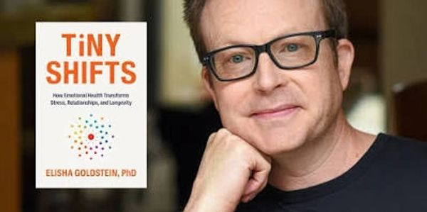 Author Elisha Goldstein with his book Tiny Shifts on emotional health.