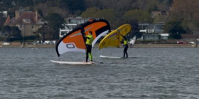 Beginner wing surfing lesson in Poole – Flow Watersports 1:1 coaching