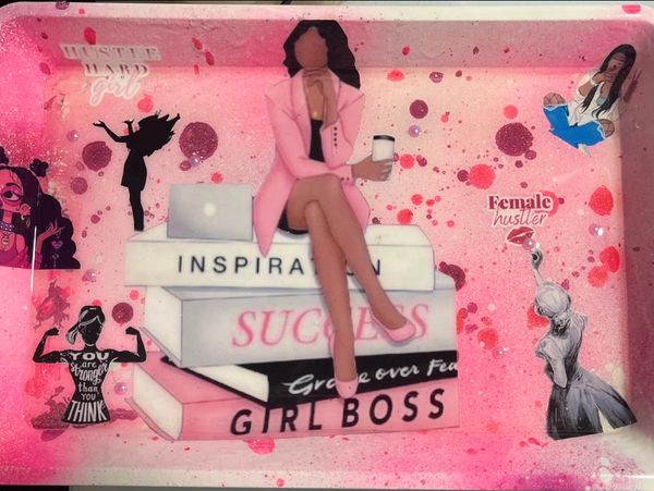 Illustration of a confident woman sitting on motivational books with empowering messages.