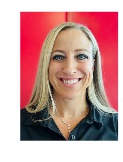 Smiling woman with blonde hair wearing a black Jaguar Theraputics shirt.