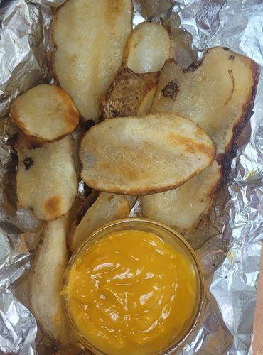 Prairie fries with warm cheese dip