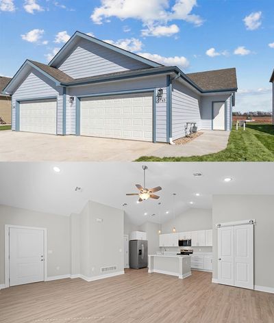 Modern duplex with a spacious, bright interior and attached garages.