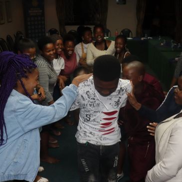 Group of friends having fun indoors.