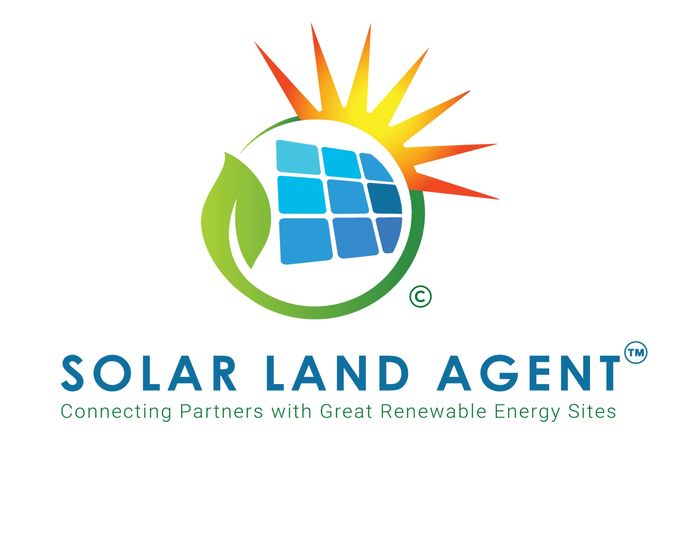 A charming gray house on a grassy hill by the ocean under a clear blue sky.